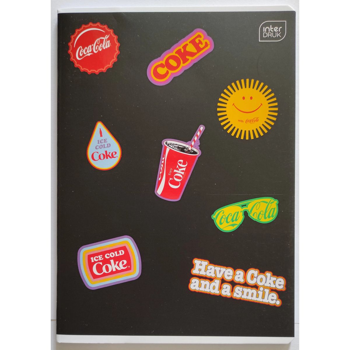 Zeszyt Interdruk COCA COLA MAT+UV A5 32k. 70g trzy linie